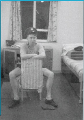 Dai Rees trying on one of the caps from his vast collection